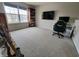 Bright loft space with a window, bookshelf, and desk setup, perfect for a home office or gaming area at 1336 Danielle Rd, Lebanon, IN 46052