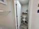 Efficient half bath with a toilet and decorative shelf, perfect for guests at 1336 Danielle Rd, Lebanon, IN 46052