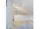 Finished attic area featuring neutral carpet and unique angled ceilings at 13921 Leatherwood Dr, Carmel, IN 46033