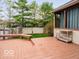 Spacious wooden deck with a built-in bench, perfect for outdoor entertaining at 13921 Leatherwood Dr, Carmel, IN 46033