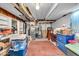 Unfinished basement showcasing ceiling pipes and storage with boxes at 1441 N Euclid Ave, Indianapolis, IN 46201
