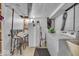 Basement laundry area with washer, dryer, refrigerator, and stool seating at 1441 N Euclid Ave, Indianapolis, IN 46201