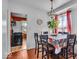 Cozy dining area with a charming chandelier and hardwood floors, perfect for Gathering meals and entertaining guests at 1441 N Euclid Ave, Indianapolis, IN 46201
