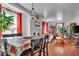 Spacious living room and dining area featuring hardwood floors, decorative lighting, and plenty of room to relax at 1441 N Euclid Ave, Indianapolis, IN 46201