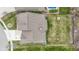 Aerial view of the home's roof, yard, in-ground pool and manicured landscape at 14918 Dawnhaven Dr, Westfield, IN 46074