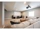 Spacious basement featuring a large screen, projector, and comfy seating area at 14918 Dawnhaven Dr, Westfield, IN 46074