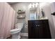 Cozy bathroom featuring floating shelves, neutral walls, and a modern vanity at 14918 Dawnhaven Dr, Westfield, IN 46074