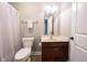 Cozy bathroom featuring a vanity with storage, toilet, and shower with curtain at 14918 Dawnhaven Dr, Westfield, IN 46074