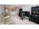 Large bonus room with gaming setup, comfortable seating and natural light at 14918 Dawnhaven Dr, Westfield, IN 46074