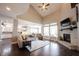 Open-concept living area with fireplace, and view into the kitchen at 14918 Dawnhaven Dr, Westfield, IN 46074