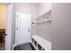 Mudroom featuring a white entry door, bench with storage, and hooks for coats at 14918 Dawnhaven Dr, Westfield, IN 46074
