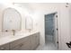 Elegant bathroom with dual sinks, quartz countertops, and modern fixtures for a spa-like experience at 15109 Larchwood Dr, Westfield, IN 46074