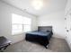 Cozy bedroom with a comfortable bed and a bright window, creating a peaceful retreat at 15109 Larchwood Dr, Westfield, IN 46074