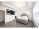 Spacious bedroom with a large TV and connected bathroom at 15109 Larchwood Dr, Westfield, IN 46074