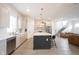 Bright, modern kitchen featuring a large island, stainless steel appliances, and an open layout at 15109 Larchwood Dr, Westfield, IN 46074