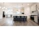 Modern kitchen with a large island, pendant lighting, stainless steel appliances, and ample counter space at 15109 Larchwood Dr, Westfield, IN 46074