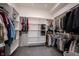 Spacious walk-in closet with custom shelving and ample hanging space for organized storage solutions at 15109 Larchwood Dr, Westfield, IN 46074