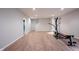 Spacious finished basement with hardwood floors, and recessed lighting, ideal for recreation and relaxation at 15591 Heatherbank Dr, Westfield, IN 46074