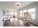 Upstairs bonus room with hardwood floors, a cozy chair, and an abundance of natural light at 15591 Heatherbank Dr, Westfield, IN 46074