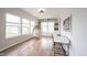 Bright office space with built-in shelving, large windows, and a comfortable egg chair at 15591 Heatherbank Dr, Westfield, IN 46074