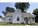 Charming single-story home featuring a well-maintained lawn, neutral siding, and a welcoming front porch area at 159 N Lincoln St, Martinsville, IN 46151