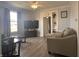 Comfortable living room featuring built-in shelving, lots of natural light, and contemporary furnishings for relaxation at 159 N Lincoln St, Martinsville, IN 46151