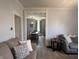 Relaxing living room with seamless flow into the dining area, providing a welcoming space for entertainment and everyday living at 159 N Lincoln St, Martinsville, IN 46151