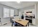 Functional kitchen with white cabinetry, a central island, and modern appliances at 1614 S Talbott St, Indianapolis, IN 46225