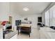 Functional kitchen with white cabinetry, a central island, and modern appliances at 1614 S Talbott St, Indianapolis, IN 46225