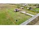 An elevated aerial view showcases the property and the neighboring residences at 1687 E 600 N, Whiteland, IN 46184