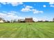Expansive backyard with well-manicured lawn at 1687 E 600 N, Whiteland, IN 46184