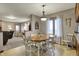Casual dining area featuring natural light, a table with chairs, and tile flooring at 1687 E 600 N, Whiteland, IN 46184