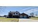 Charming home with a long driveway, two-car garage, and lots of curb appeal at 1687 E 600 N, Whiteland, IN 46184