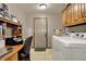 Laundry room with a built-in desk at 1687 E 600 N, Whiteland, IN 46184
