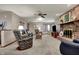 Cozy living room with a brick fireplace, comfortable seating, and warm lighting at 1687 E 600 N, Whiteland, IN 46184