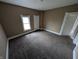 Bedroom with closet and window, ready for new occupant at 1830 Nichol Ave, Anderson, IN 46016