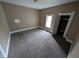 Bright bedroom with a closet and window, ready for personalization and decor at 1830 Nichol Ave, Anderson, IN 46016