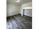 Cozy bedroom featuring fresh paint, new flooring, and an ample closet space at 2111 Central Ave, Anderson, IN 46016