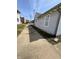 Sideyard with landscaping at 2111 Central Ave, Anderson, IN 46016