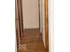 Hallway with hardwood flooring and doors at 2146 Lawrence Ave, Indianapolis, IN 46227