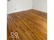 Spacious living room featuring beautiful hardwood floors and ample natural light at 2146 Lawrence Ave, Indianapolis, IN 46227