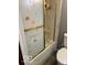 Bathroom shower with patterned glass door at 2146 Lawrence Ave, Indianapolis, IN 46227