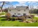 Expansive backyard featuring a deck, patio, and lush lawn, offering plenty of space for outdoor activities at 2170 Running Brook Ln, Greenwood, IN 46143