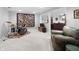 Finished basement featuring a drum kit, cozy seating, and neutral paint at 2170 Running Brook Ln, Greenwood, IN 46143