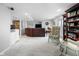Finished basement featuring comfortable seating area, bookcase, and a walkout at 2170 Running Brook Ln, Greenwood, IN 46143