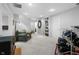 Finished basement featuring carpeted floors, a drum kit, and stairs to the main floor at 2170 Running Brook Ln, Greenwood, IN 46143