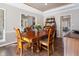 Formal dining room featuring hardwood floors and elegant decor at 2170 Running Brook Ln, Greenwood, IN 46143