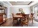 Elegant dining room featuring wood table, chairs, and wainscoting at 2170 Running Brook Ln, Greenwood, IN 46143