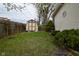Green backyard featuring grass and a shed at 218 Demarest Dr, Indianapolis, IN 46214