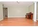 Bright and spacious living room featuring gleaming hardwood floors and neutral paint tones at 218 Demarest Dr, Indianapolis, IN 46214